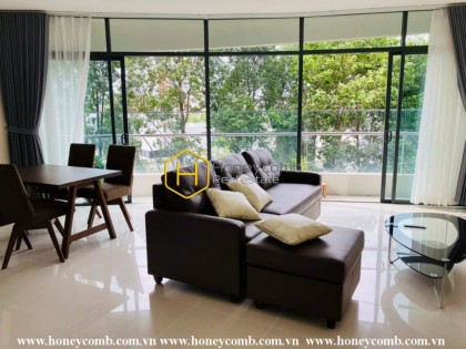 Enjoy a bright living space filled with natural light in this City Garden apartment with high, open windows