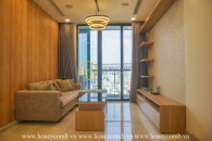 Stunning Vinhomes Golden River apartment with elegant wooden brown layouts for rent