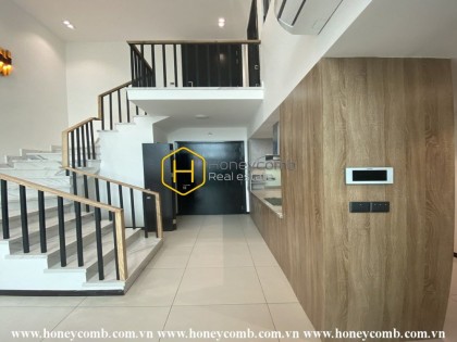 Khám phá sự kết hợp giữa phong cách tối giản hiện đại và thân thiện với môi trường tại căn hộ duplex ở Feliz en Vista