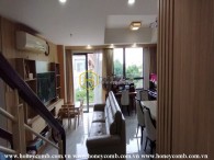 A Masteri Thao Dien apartment combining modern architecture with rustic interior